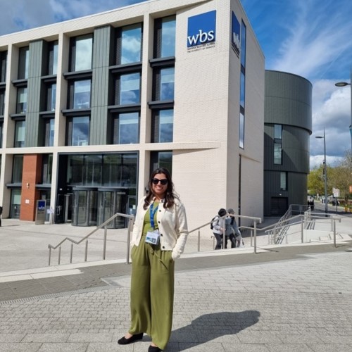 Chinchu Jayaprakash in front of the WBS building