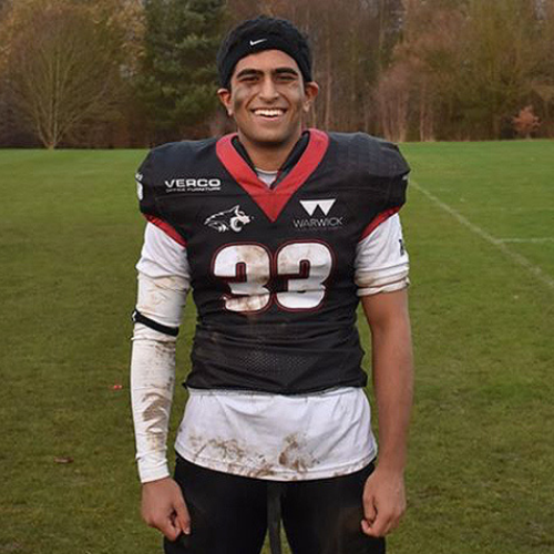 Rahoul wearing the Warwick American football kit during a game