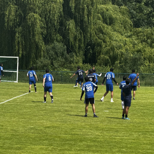 Image of the MBAT 2026 team playing football