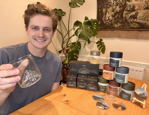 Jake Ardley showcasing the premium British glassware from his brand Gilded Peaks
