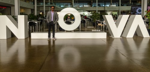 Image of Shobhit Jain infront of the Nova SBE sign