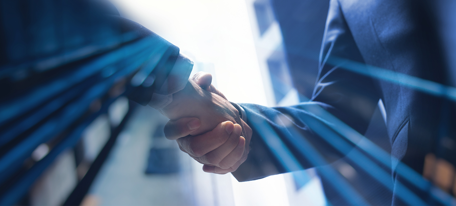 two people shaking hands two people shaking hands
