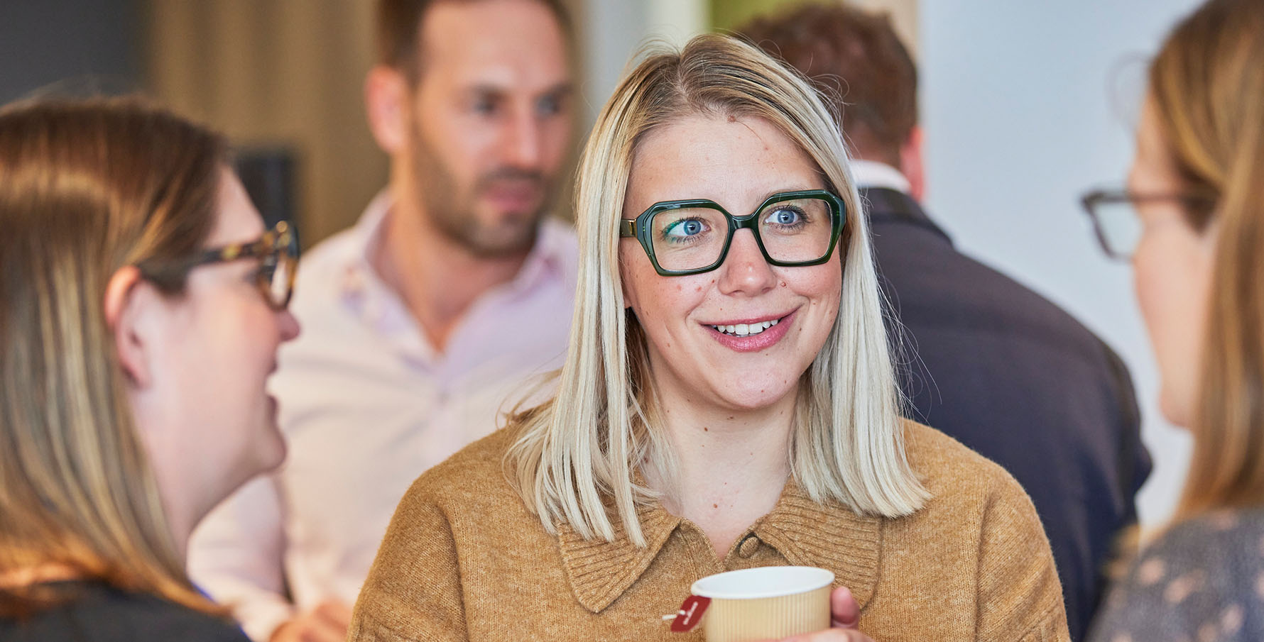 Lady smiling in seminar