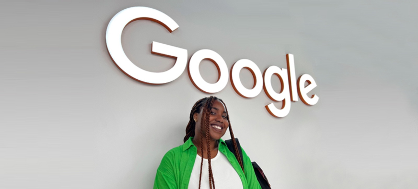Remen Ibhawoh in front of a Google sign. Remen Ibhawoh in front of a Google sign.