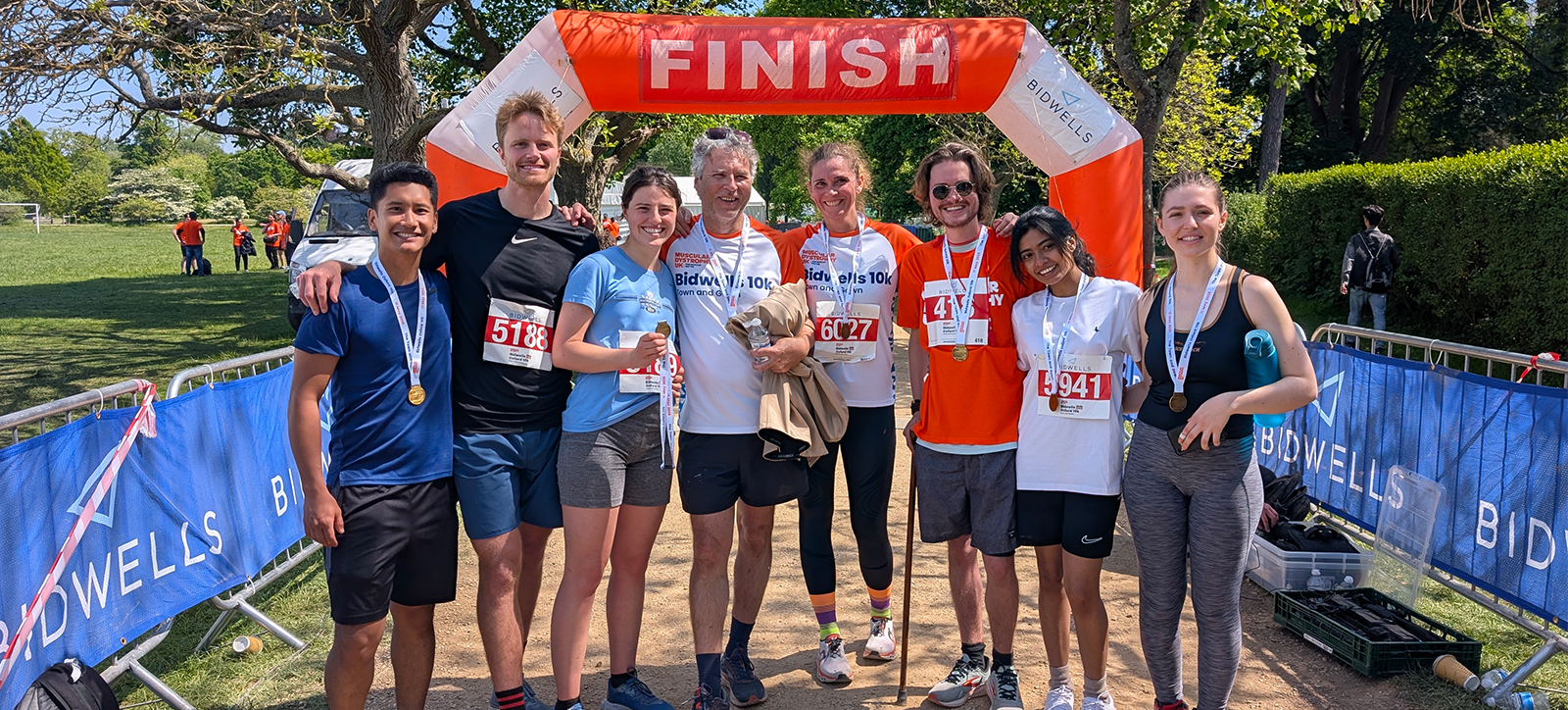 Tristan Boedts (second from the right) with four friends in front of the finish line at a 10km race in Oxford to raise money and awareness for Muscular Dystrophy Tristan Boedts (second from the right) with four friends in front of the finish line at a 10km race in Oxford to raise money and awareness for Muscular Dystrophy