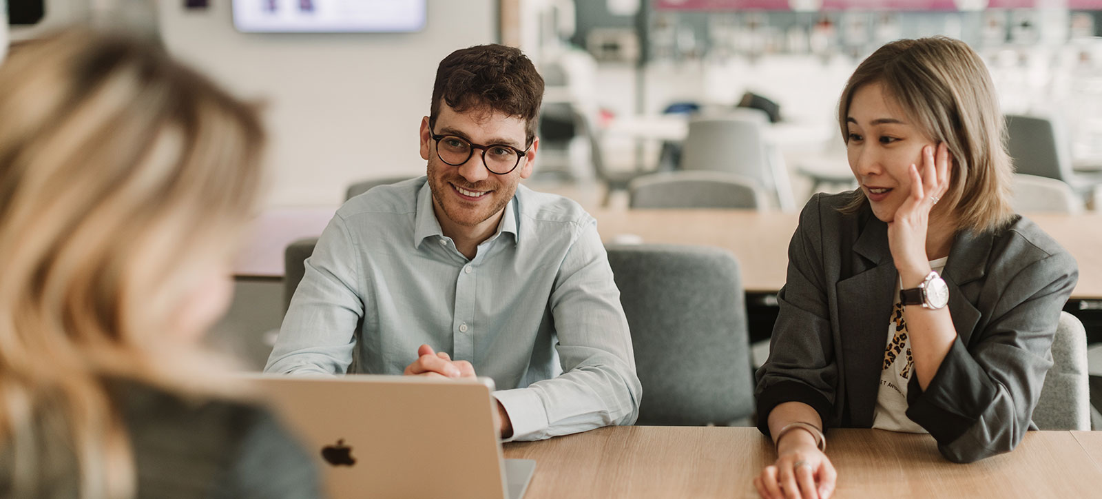 Global Online MBA students working as a team