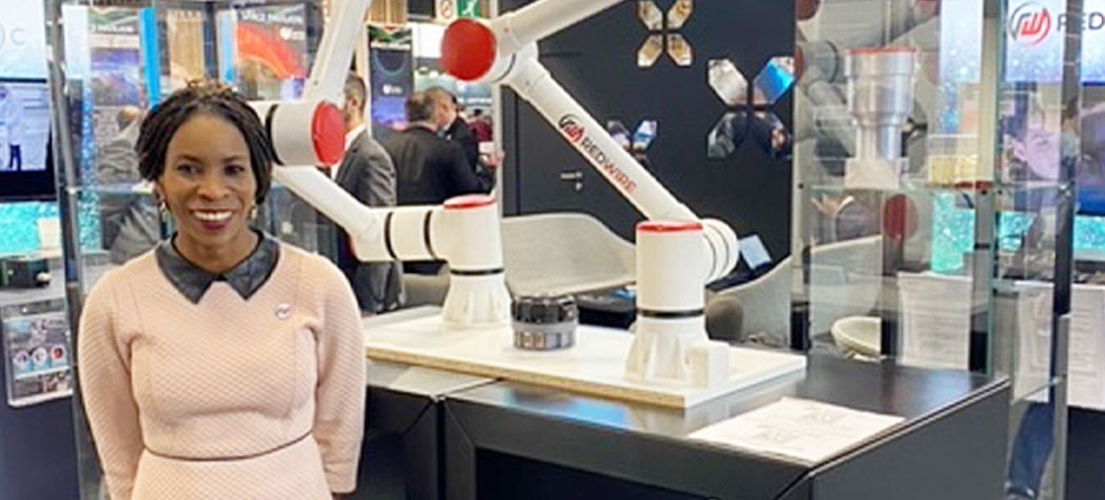 Jessica Whytehorn of Luxembourg space tech firm Red Wire with a robotic arm