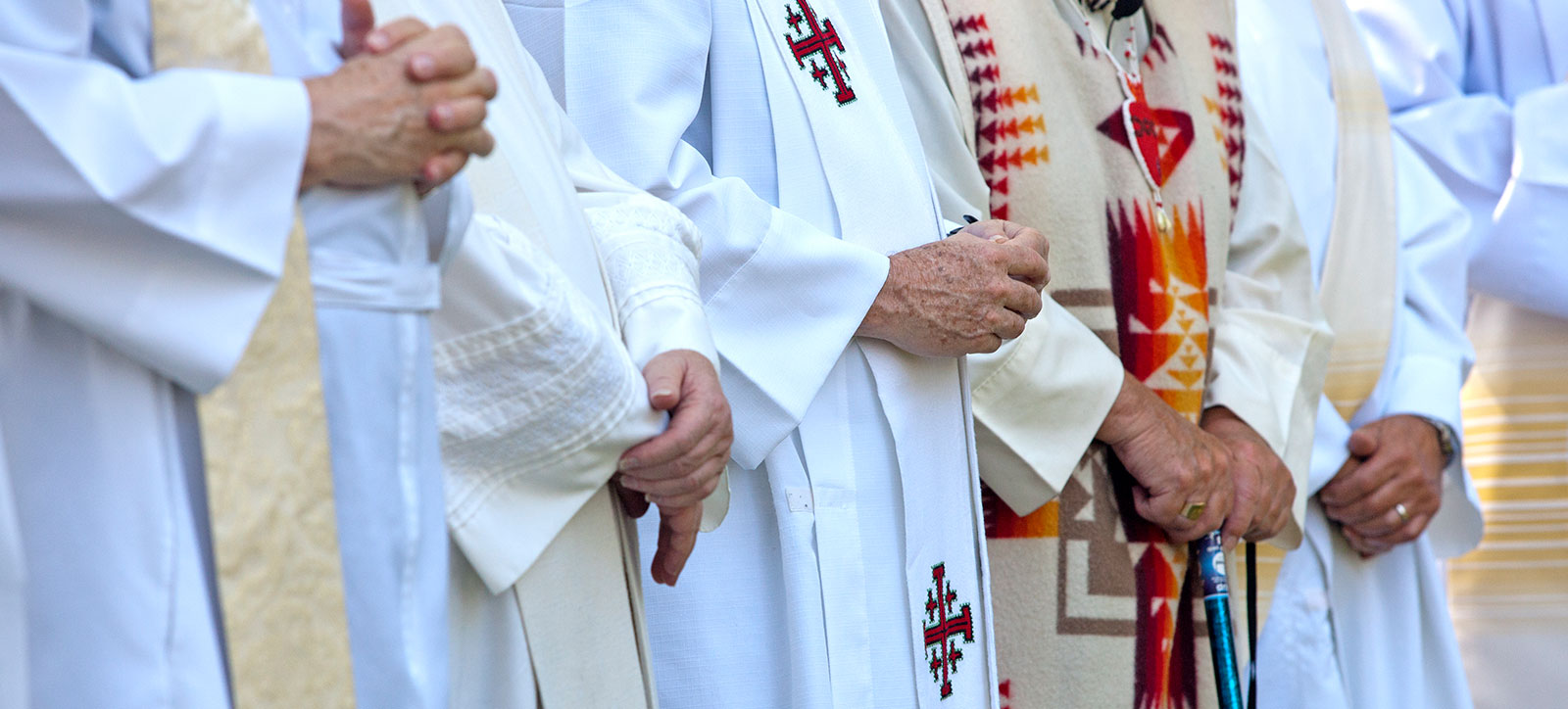 Priests with folded hands Priests with folded hands
