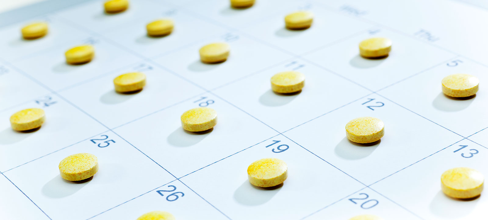A calendar with a pill on each day to remind a patient to take their medication as prescribed A calendar with a pill on each day to remind a patient to take their medication as prescribed