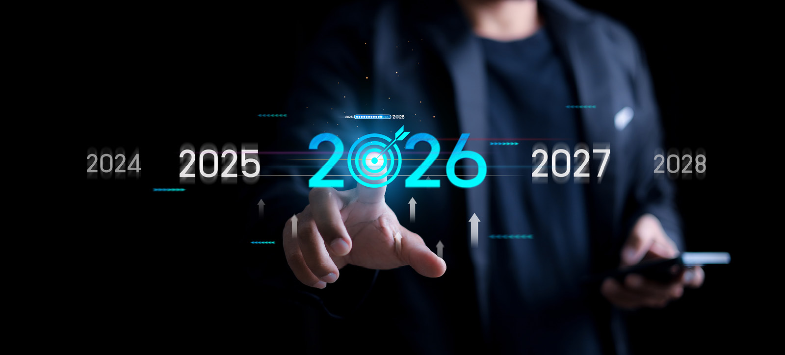A businessperson in a suit uses their hand to scroll through a hologrammatic display of different years to select 2026.