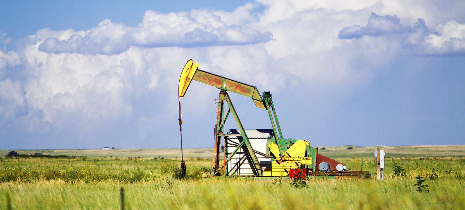 Workers use heavy machinery to frack for shale gas