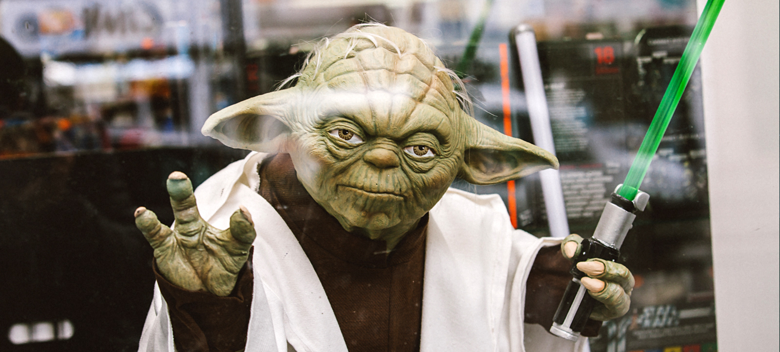 A portrait of Yoda from the iconic sci-fi franchise Star Wars.