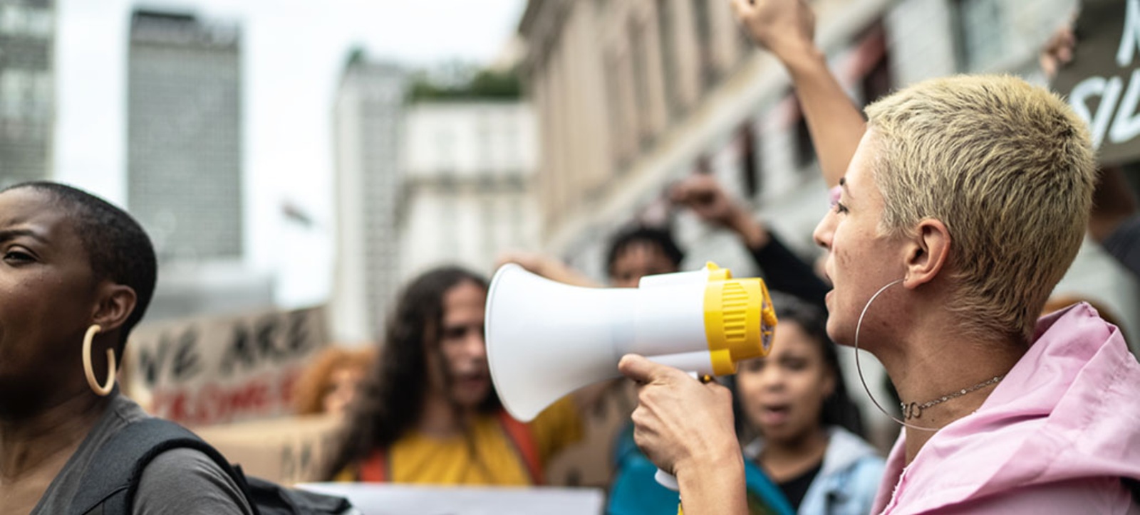 Workers protest over pay and conditions while taking industrial action.