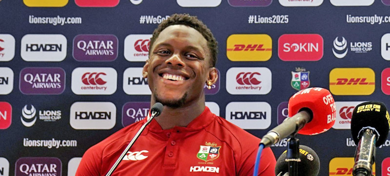 Warwick Business School alum and England men's rugby union captain Maro Itoje in a British Lion's shirt as he gives his first press conference after being appointed as captain for the team's tour of Australia.