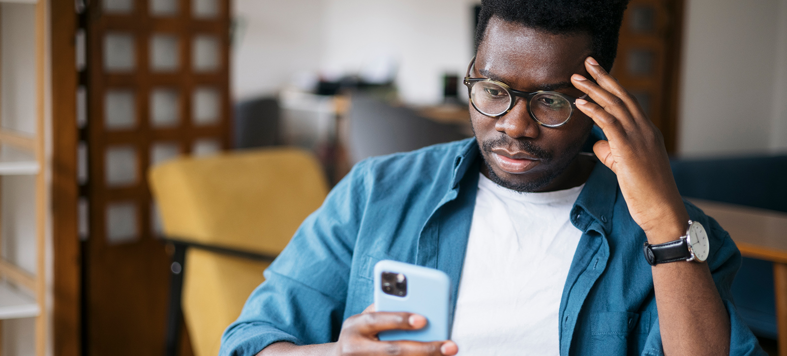 A man looking at his mobile phone