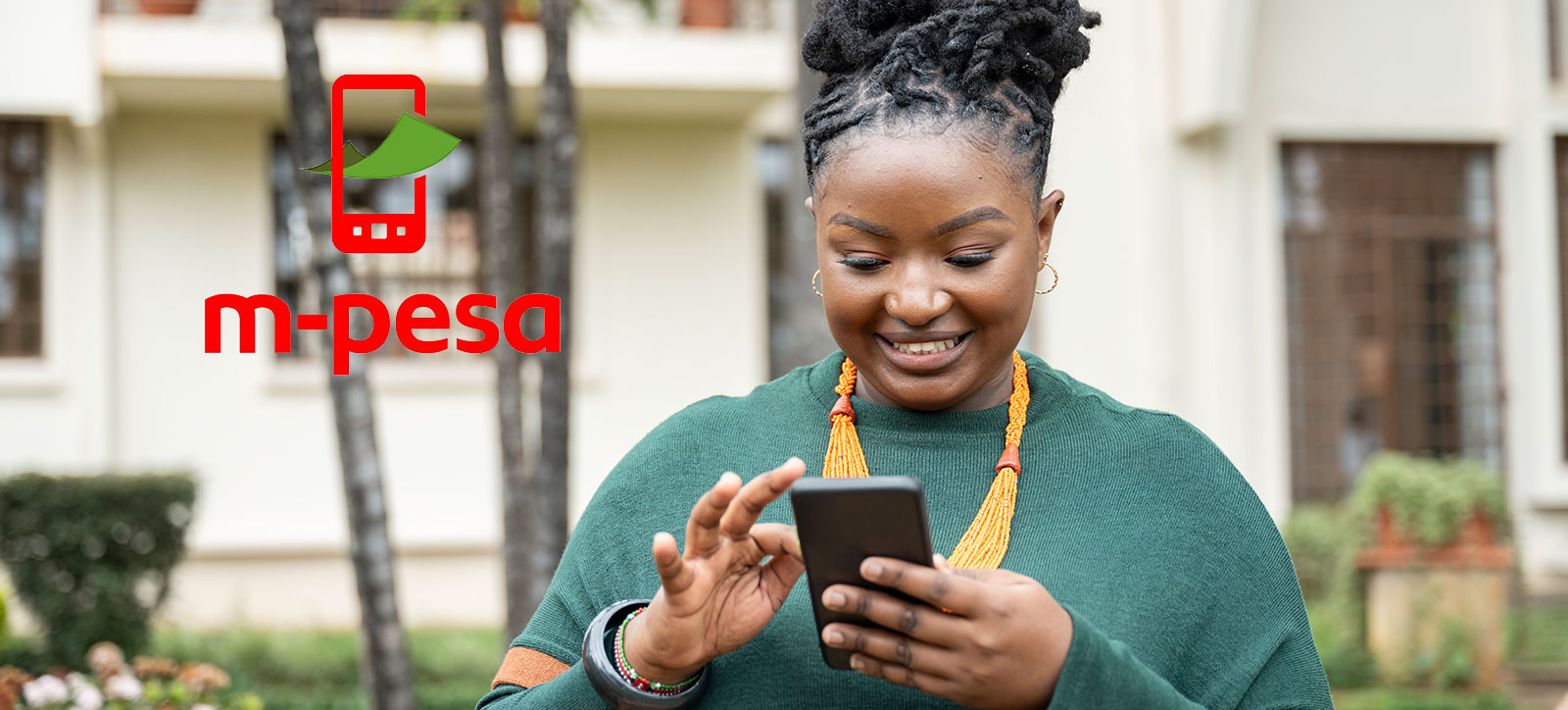 A Kenyan woman uses the M-PESA mobile payment platform on her phone A Kenyan woman uses the M-PESA mobile payment platform on her phone