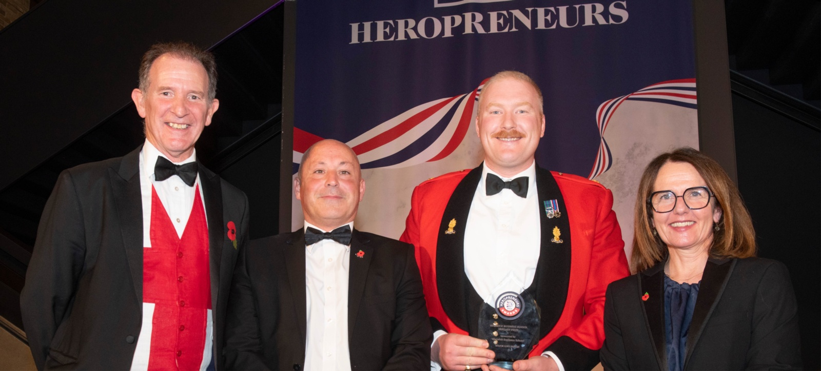 Major Luke Parker with his Heroprenuers award